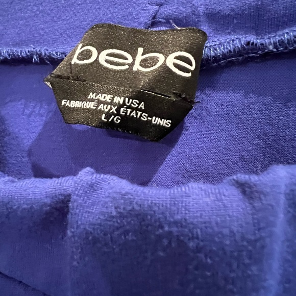 Short A-line flare Bebe skirt. - Picture 3 of 4